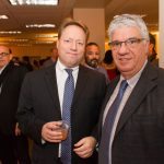 Senator Wayne D. Fontana and John Paul Jones enjoy a moment at Pittsburgh's Holiday Party